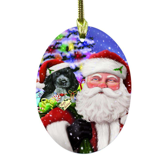 Jolly Old Saint Nick Santa Holding Cocker Spaniel Dog and Happy Holiday Gifts Oval Glass Christmas Ornament OGOR48844