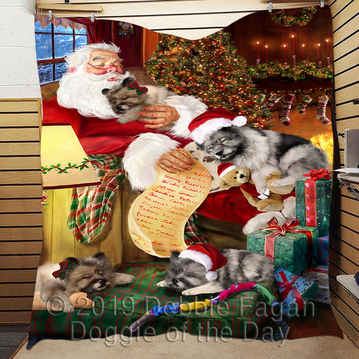 Santa Sleeping with Keeshond Dogs Quilt