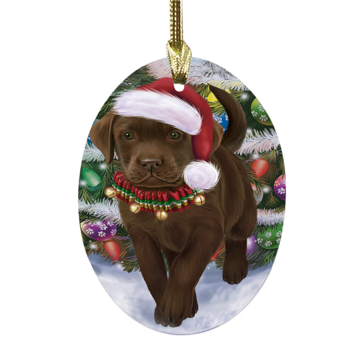 Trotting in the Snow Labrador Retriever Dog Oval Glass Christmas Ornament OGOR49452