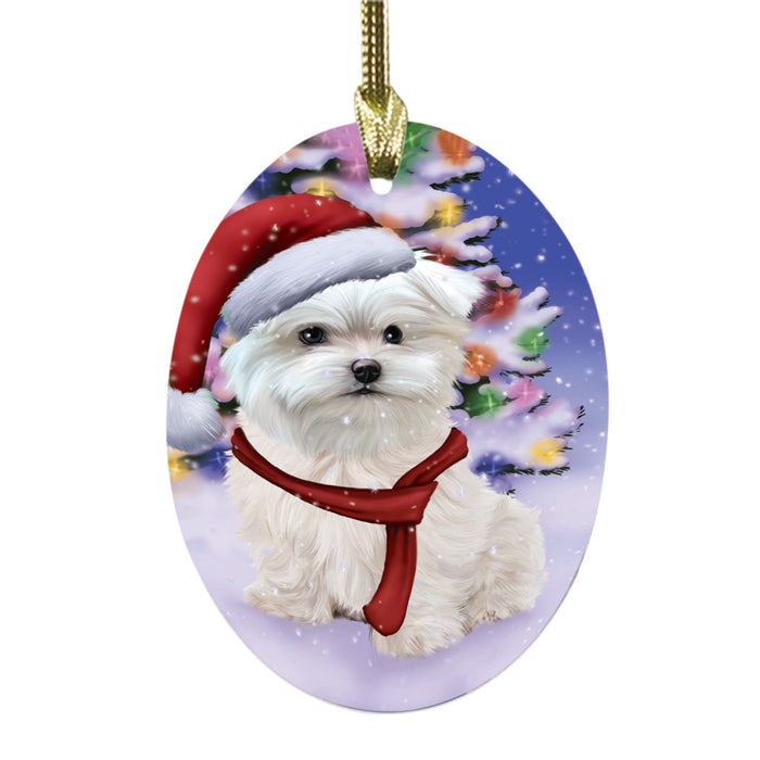 Winterland Wonderland Maltese Dog In Christmas Holiday Scenic Background Oval Glass Christmas Ornament OGOR49605