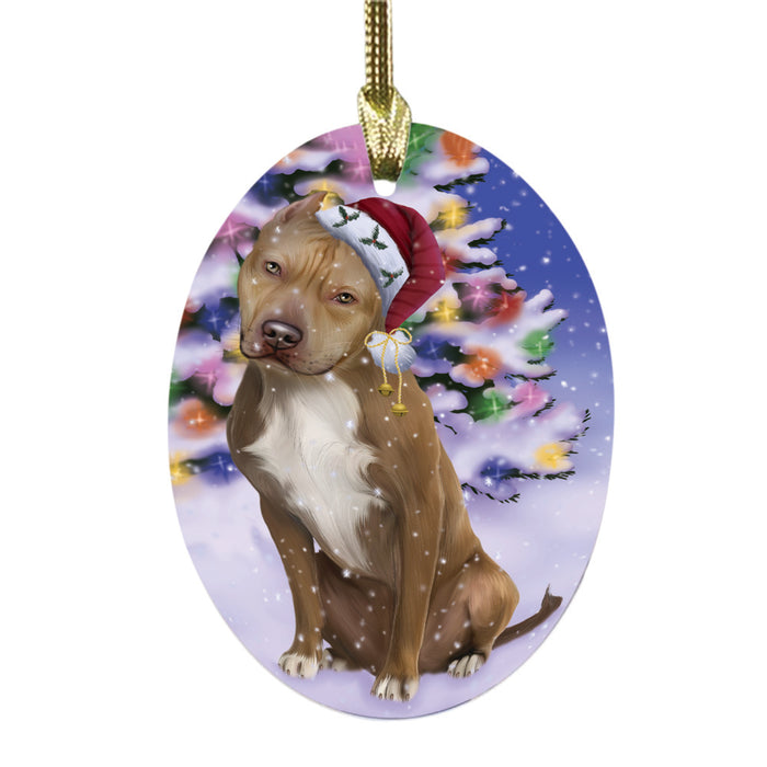 Winterland Wonderland Pit Bull Dog In Christmas Holiday Scenic Background Oval Glass Christmas Ornament OGOR49613