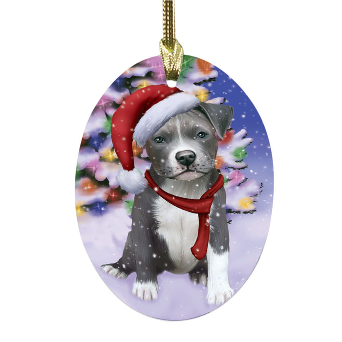 Winterland Wonderland Pit Bull Dog In Christmas Holiday Scenic Background Oval Glass Christmas Ornament OGOR49614