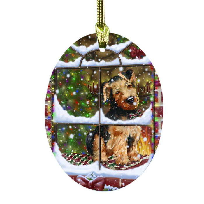 Please Come Home For Christmas Airedales Dog Sitting In Window Oval Glass Christmas Ornament OGOR49109