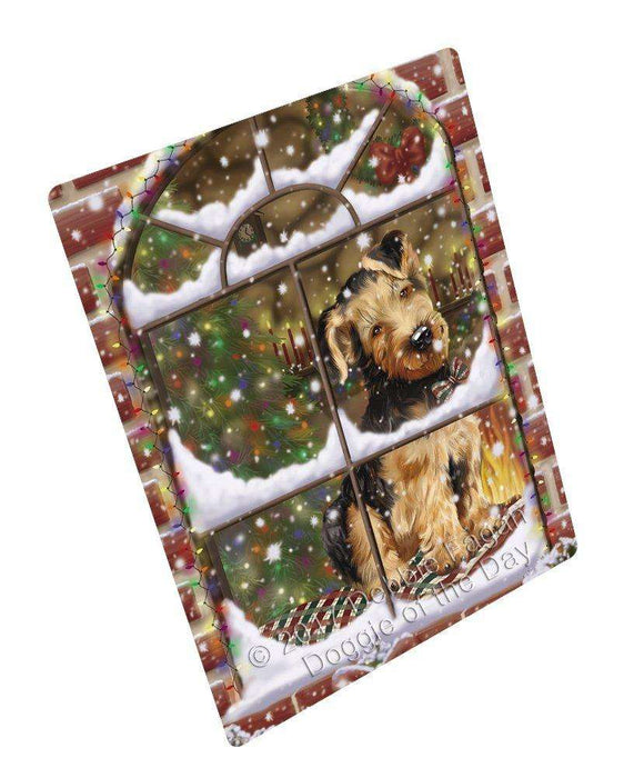 Please Come Home For Christmas Airedales Dog Sitting In Window Tempered Cutting Board