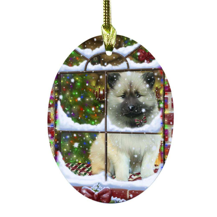 Please Come Home For Christmas Keeshond Dog Sitting In Window Oval Glass Christmas Ornament OGOR49179