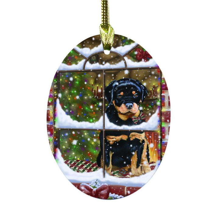 Please Come Home For Christmas Rottweiler Dog Sitting In Window Oval Glass Christmas Ornament OGOR49201
