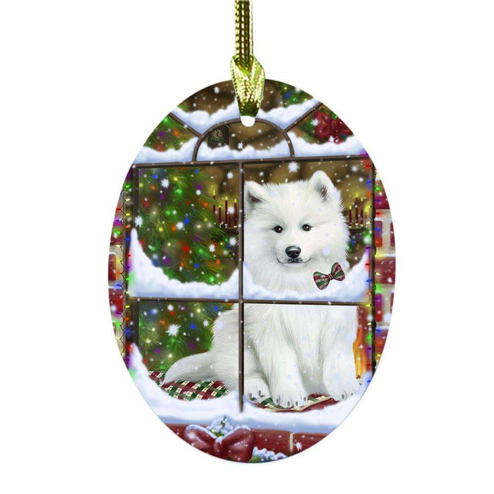 Please Come Home For Christmas Samoyed Dog Sitting In Window Oval Glass Christmas Ornament OGOR49203