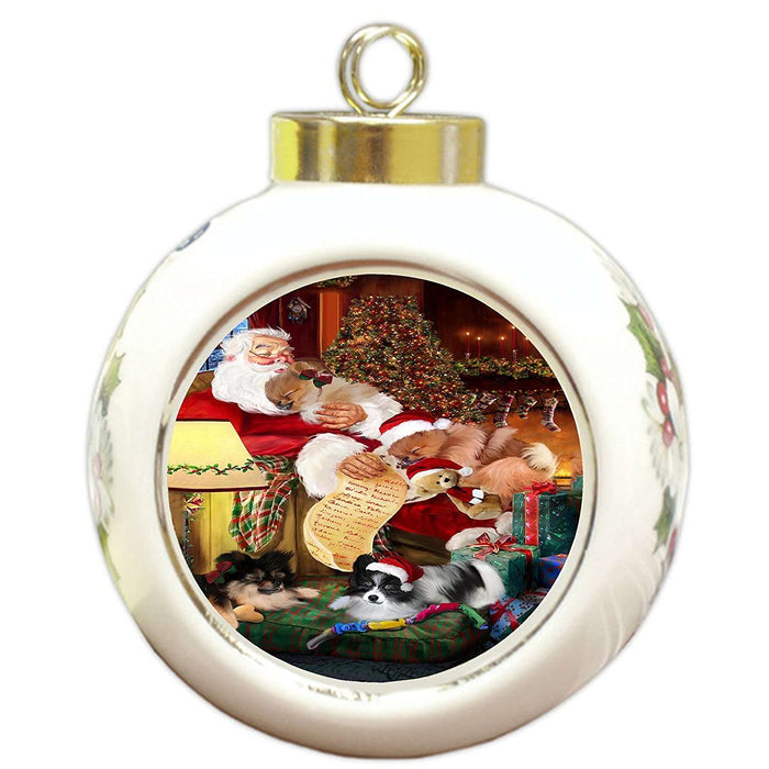 Pomeranian Dog and Puppies Sleeping with Santa Round Ball Christmas Ornament