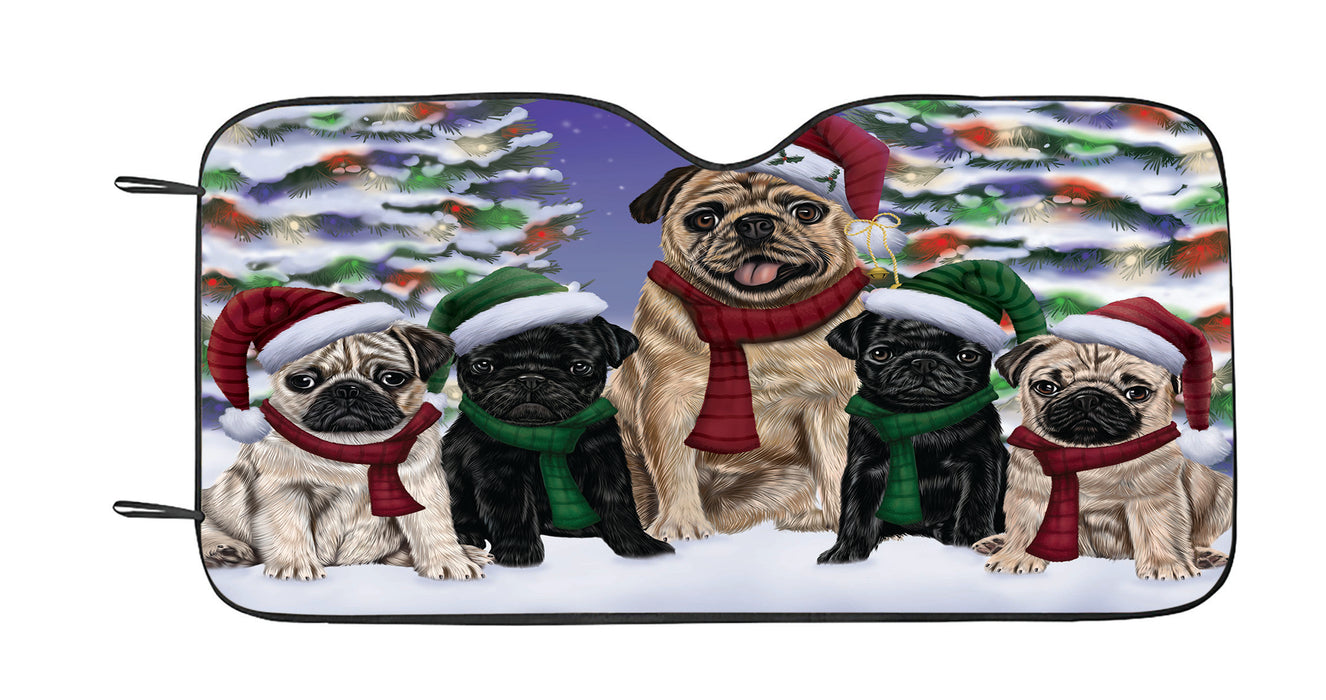 Pug Dogs Christmas Family Portrait in Holiday Scenic Background Car Sun Shade