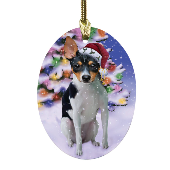 Winterland Wonderland Rat Terrier Dog In Christmas Holiday Scenic Background Oval Glass Christmas Ornament OGOR49622
