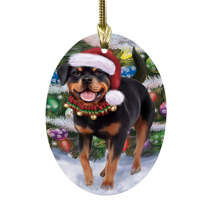 Trotting in the Snow Rottweiler Dog Oval Glass Christmas Ornament OGOR49455