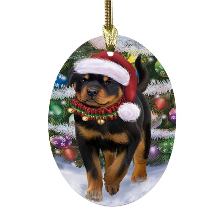 Trotting in the Snow Rottweiler Dog Oval Glass Christmas Ornament OGOR49456