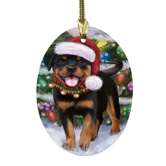 Trotting in the Snow Rottweiler Dog Oval Glass Christmas Ornament OGOR49457