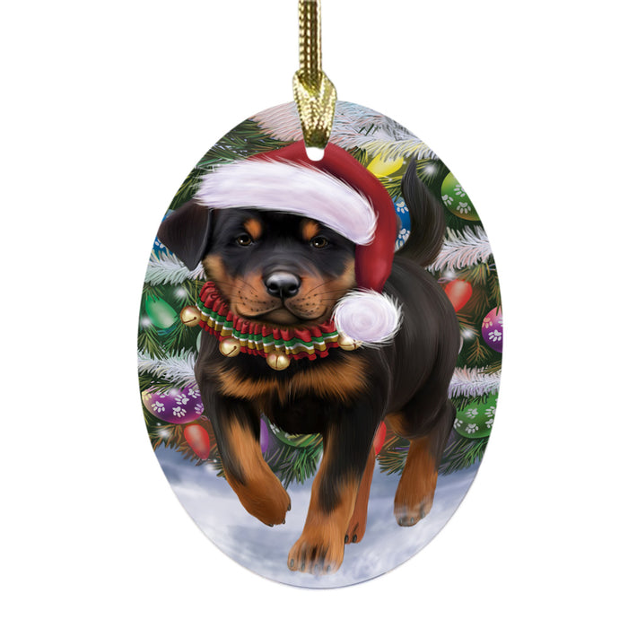 Trotting in the Snow Rottweiler Dog Oval Glass Christmas Ornament OGOR49458