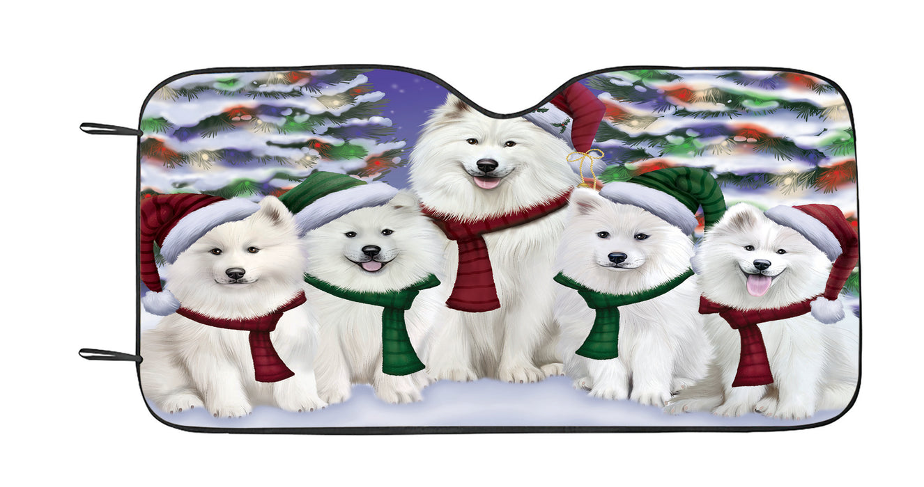 Samoyed Dogs Christmas Family Portrait in Holiday Scenic Background Car Sun Shade