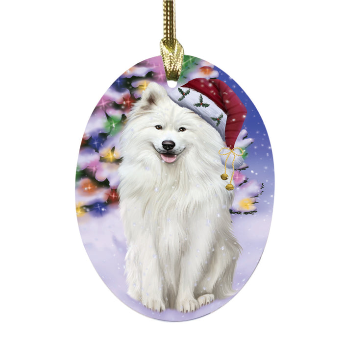 Winterland Wonderland Samoyed Dog In Christmas Holiday Scenic Background Oval Glass Christmas Ornament OGOR49630