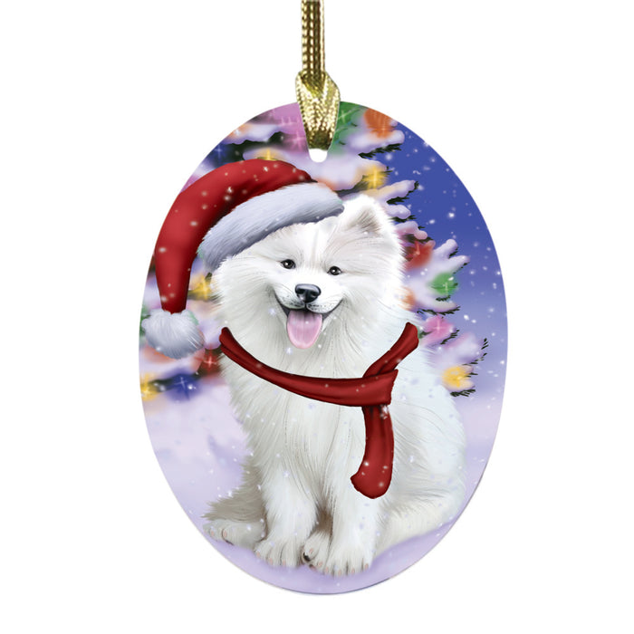 Winterland Wonderland Samoyed Dog In Christmas Holiday Scenic Background Oval Glass Christmas Ornament OGOR49631
