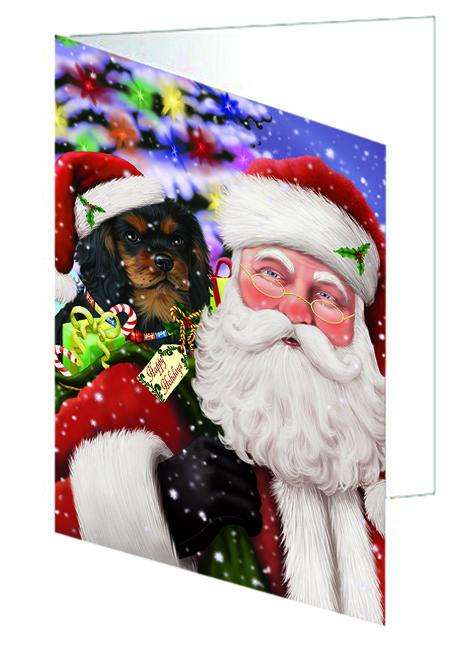 Santa Carrying Cavalier King Charles Spaniel Dog and Christmas Presents Handmade Artwork Assorted Pets Greeting Cards and Note Cards with Envelopes for All Occasions and Holiday Seasons GCD65951