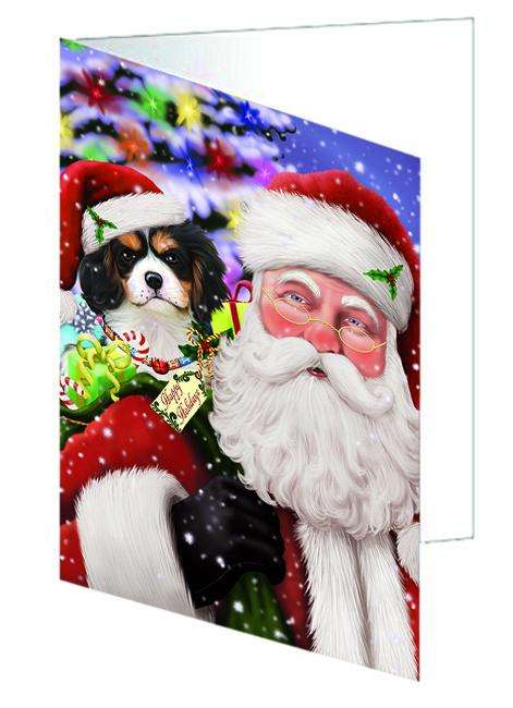 Santa Carrying Cavalier King Charles Spaniel Dog and Christmas Presents Handmade Artwork Assorted Pets Greeting Cards and Note Cards with Envelopes for All Occasions and Holiday Seasons GCD65954