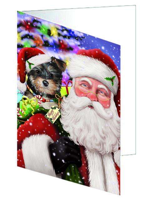 Santa Carrying Yorkipoo Dog and Christmas Presents Handmade Artwork Assorted Pets Greeting Cards and Note Cards with Envelopes for All Occasions and Holiday Seasons GCD65168