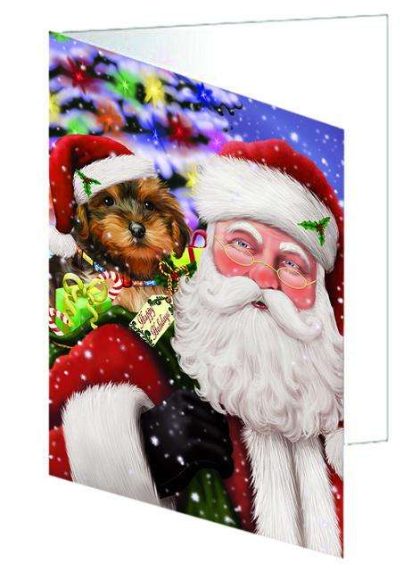 Santa Carrying Yorkipoo Dog and Christmas Presents Handmade Artwork Assorted Pets Greeting Cards and Note Cards with Envelopes for All Occasions and Holiday Seasons GCD65171