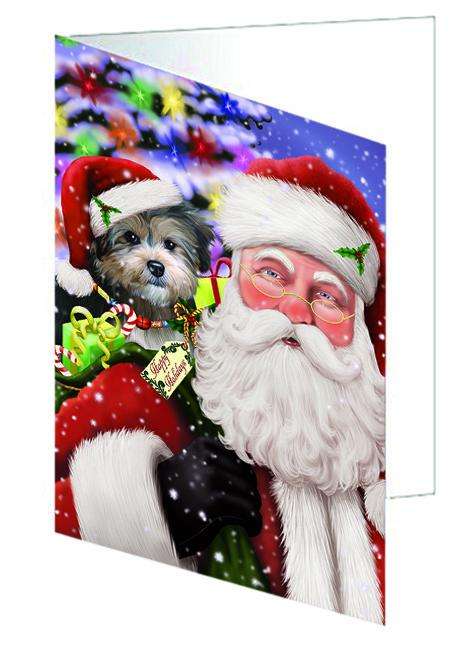 Santa Carrying Yorkipoo Dog and Christmas Presents Handmade Artwork Assorted Pets Greeting Cards and Note Cards with Envelopes for All Occasions and Holiday Seasons GCD65177