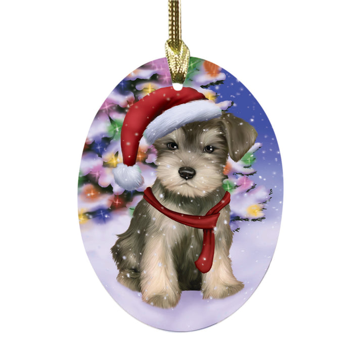 Winterland Wonderland Schnauzer Dog In Christmas Holiday Scenic Background Oval Glass Christmas Ornament OGOR49633