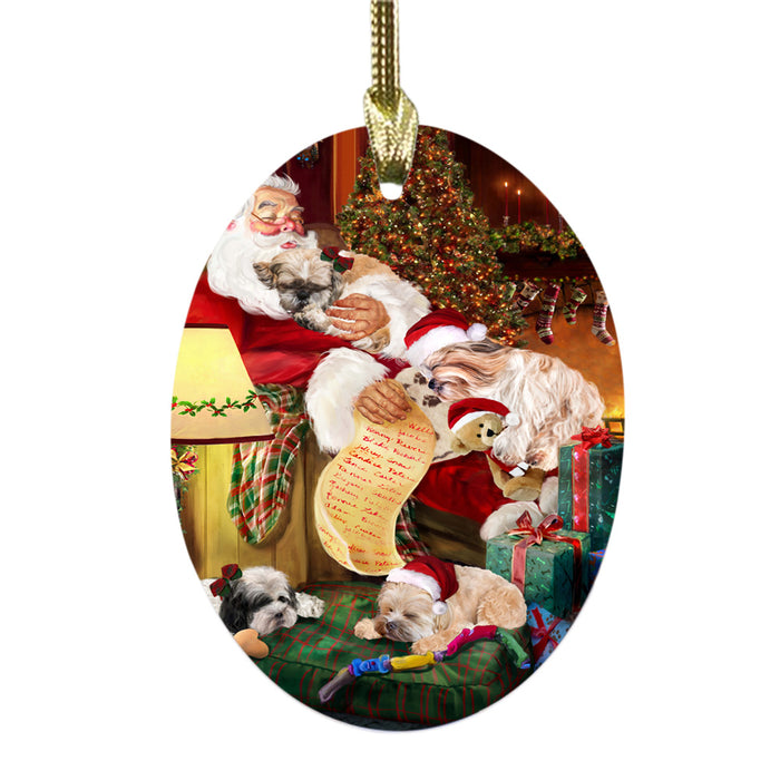 Shih Tzus Dog and Puppies Sleeping with Santa Oval Glass Christmas Ornament OGOR49319