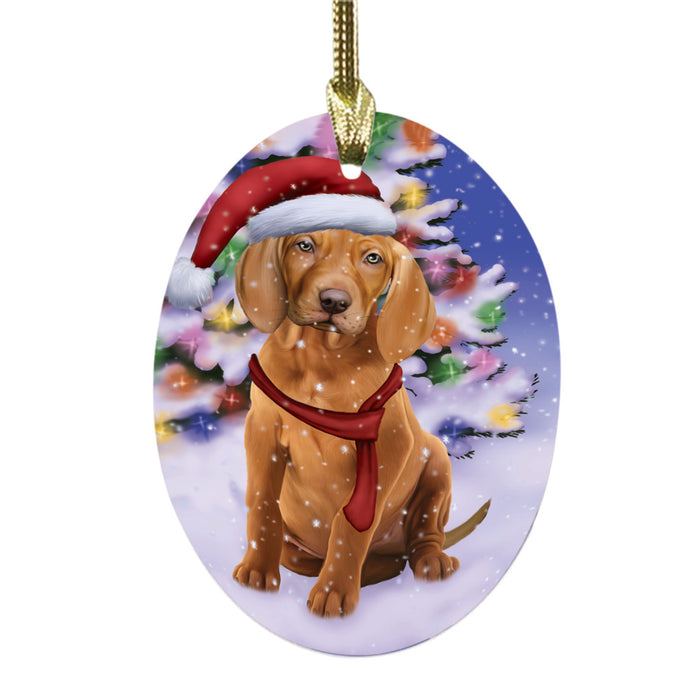 Winterland Wonderland Vizsla Dog In Christmas Holiday Scenic Background Oval Glass Christmas Ornament OGOR49654