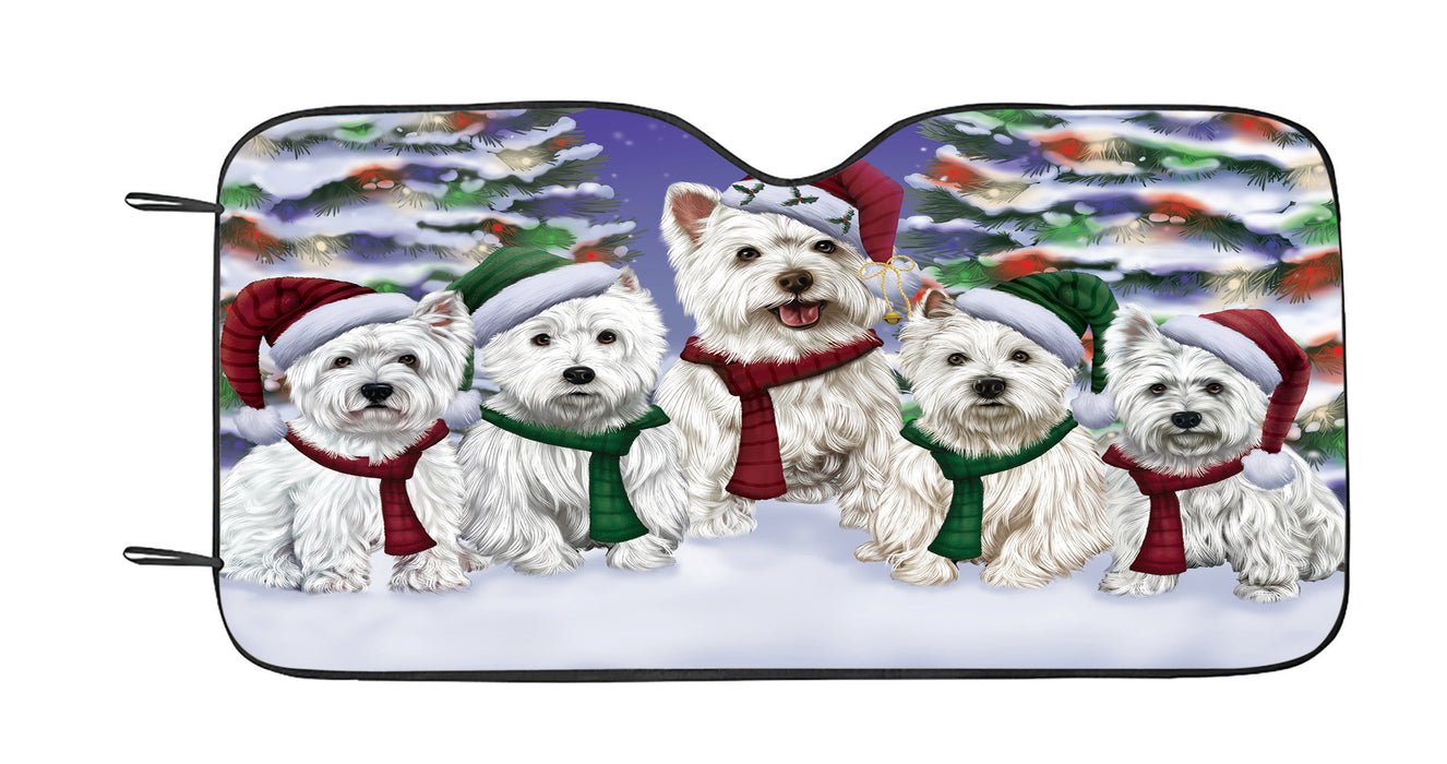 West Highland Terrier Dogs Christmas Family Portrait in Holiday Scenic Background Car Sun Shade