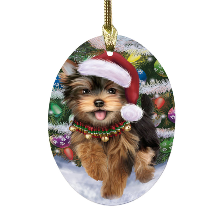 Trotting in the Snow Yorkshire Terrier Dog Oval Glass Christmas Ornament OGOR49473