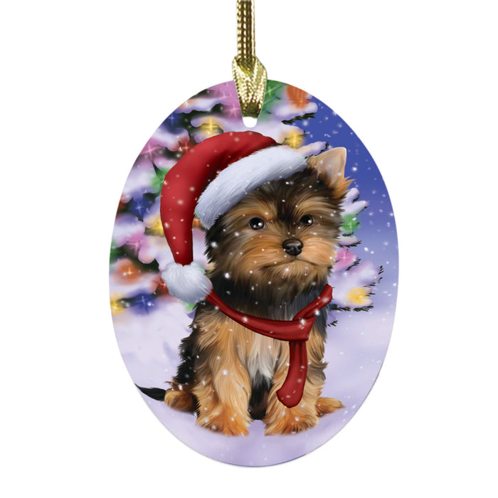 Winterland Wonderland Yorkshire Terrier Dog In Christmas Holiday Scenic Background Oval Glass Christmas Ornament OGOR49670